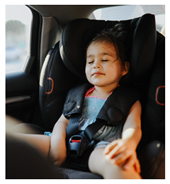 image of baby sleeping in car seat
